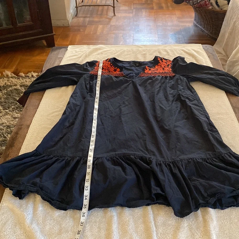 J. Crew adorable, flattering, comfy dress with great pockets. Worn once